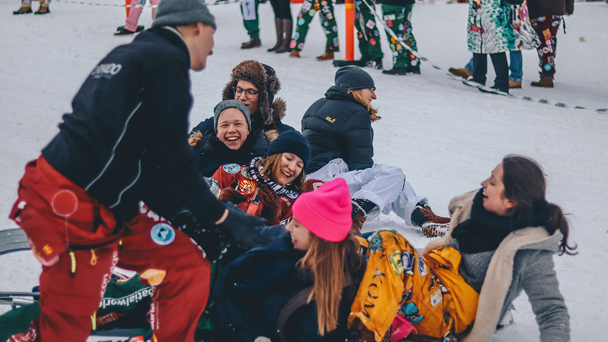 Group of European netizens enjoying snow, dressed warmly, illustrating common misconceptions about their countries outdoors in winter.