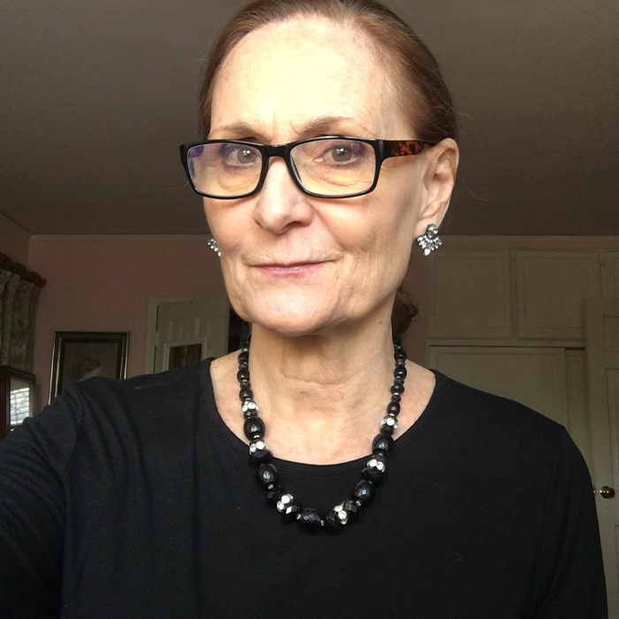 Beloved 90s star and Rain Man co-star wearing glasses and black outfit, photographed indoors with a neutral expression. Beloved 90s star and Rain Man co-star wearing glasses and black outfit, photographed indoors with a neutral expression.