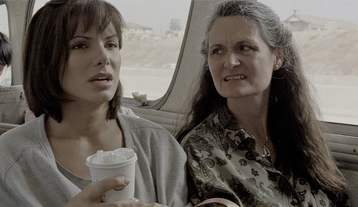 Two women sitting inside a vehicle, one holding a cup, highlighting a beloved ’90s star and Rain Man co-star. Two women sitting inside a vehicle, one holding a cup, highlighting a beloved ’90s star and Rain Man co-star.