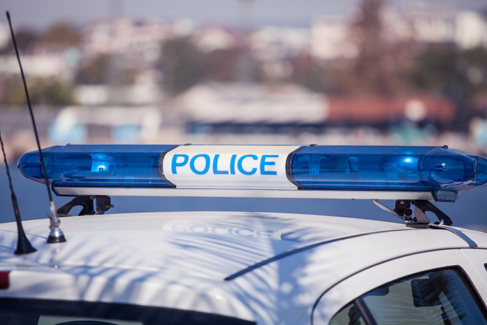 Close-up of a police car roof with blue emergency lights, symbolizing the arrest of a man with a disturbing criminal record. Close-up of a police car roof with blue emergency lights, symbolizing the arrest of a man with a disturbing criminal record.