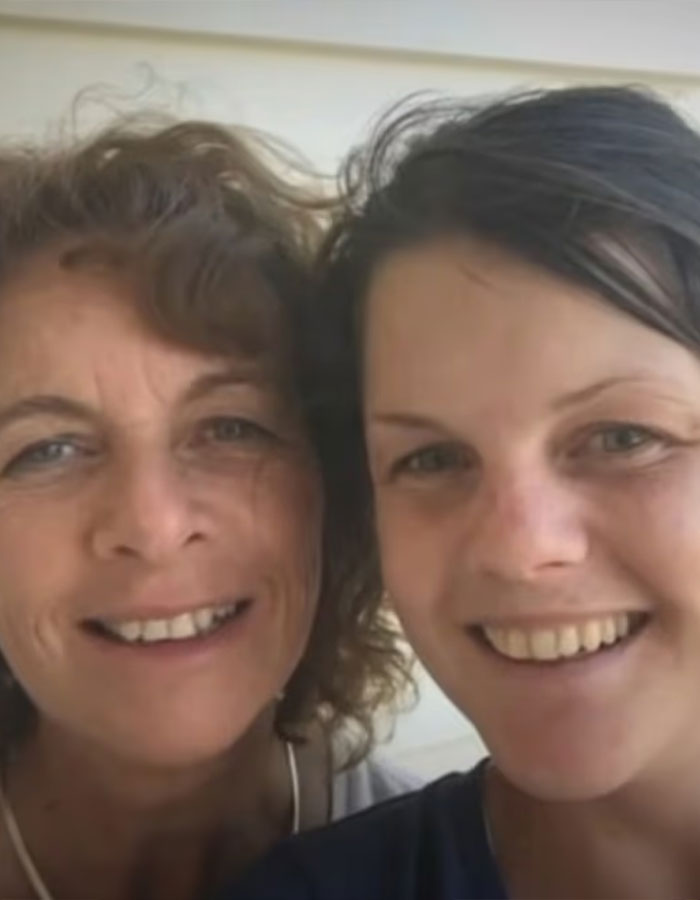 Two women smiling closely together in a casual setting, related to Australian woman caffeine consumption awareness. Two women smiling closely together in a casual setting, related to Australian woman caffeine consumption awareness.