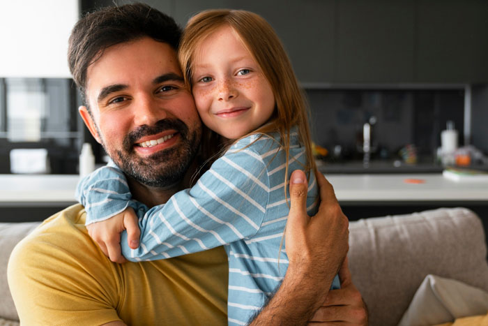 Smiling father hugging daughter in a cozy home, reflecting on relationship doubts despite an 8-year affair controversy. Smiling father hugging daughter in a cozy home, reflecting on relationship doubts despite an 8-year affair controversy.