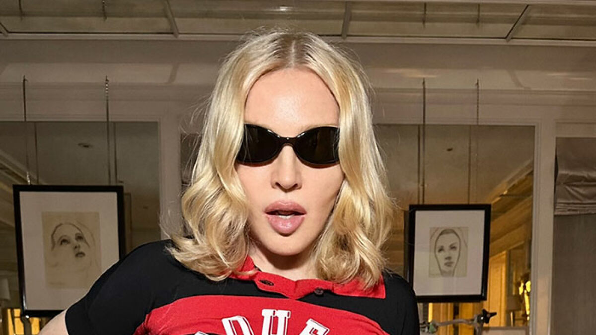 Madonna wearing sunglasses indoors, criticized by Hamilton star for disrespectful behavior during the show performance.