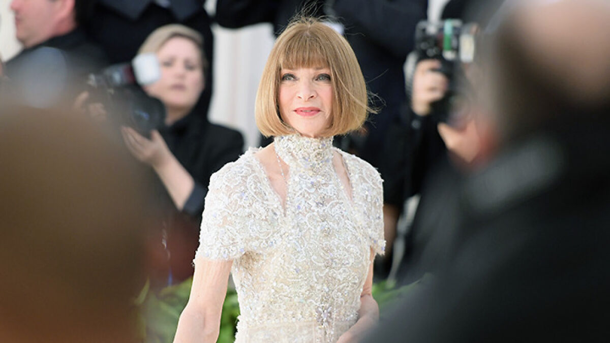 Anna Wintour attending a high-profile event, marking a significant moment in Vogue's leadership history.