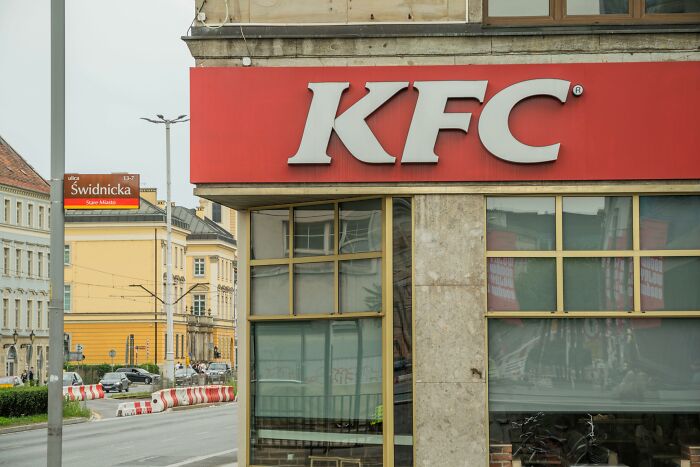KFC restaurant exterior on a city street, unrelated to creepy and chilling spots in the U.S. causing visitors to say never again.