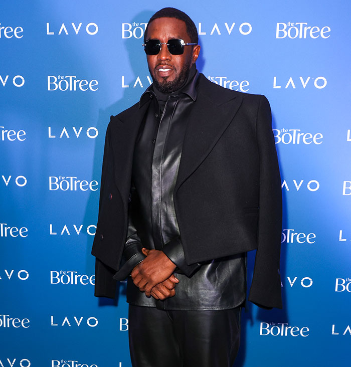 Diddy wearing sunglasses and a black leather outfit at a public event revealing an aged look amid court trial claims. Diddy wearing sunglasses and a black leather outfit at a public event revealing an aged look amid court trial claims.