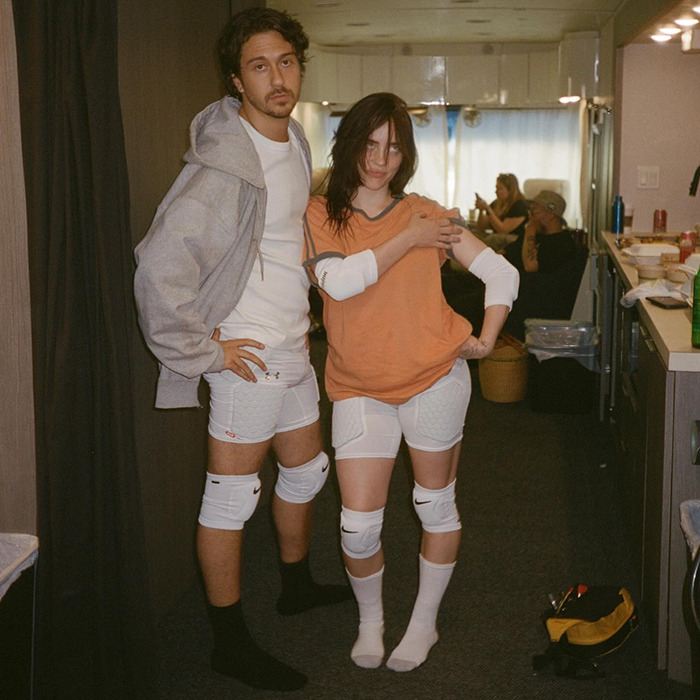 Couple in casual sportswear posing indoors, illustrating the trend of famous lesbians who have gotten boyfriends this year. Couple in casual sportswear posing indoors, illustrating the trend of famous lesbians who have gotten boyfriends this year.