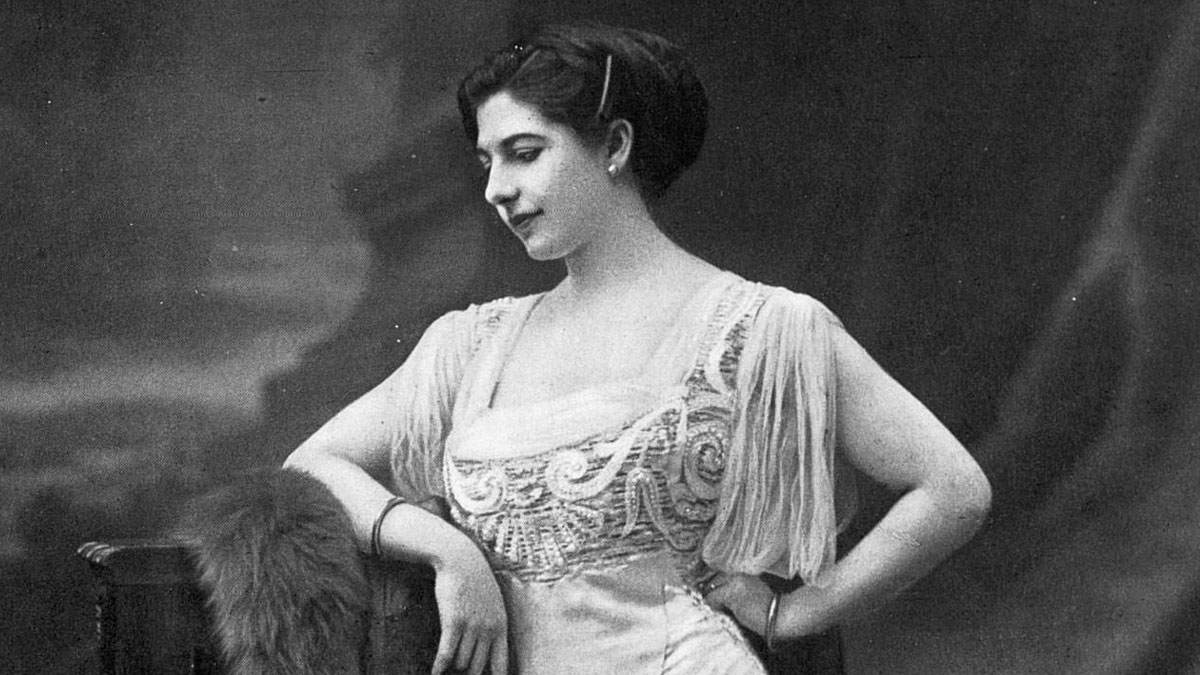Vintage black and white portrait of a famous historical woman posing elegantly, highlighting good looking famous names from history.