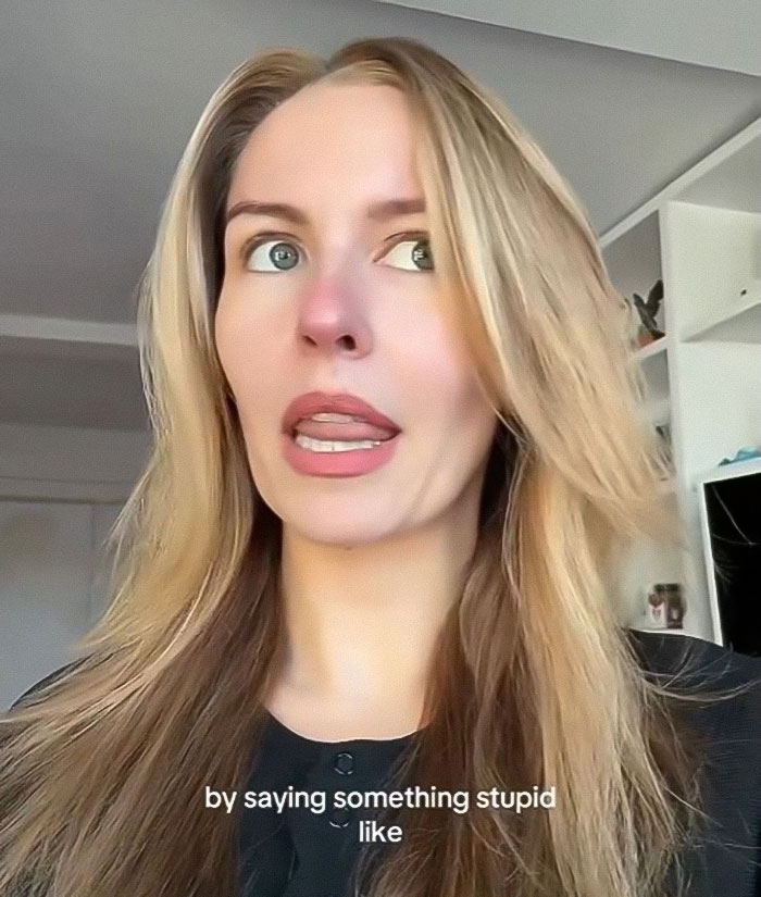 Woman reacting emotionally in a home setting, relating to a story about a pushy influencer rejected by Taylor Swift. Woman reacting emotionally in a home setting, relating to a story about a pushy influencer rejected by Taylor Swift.