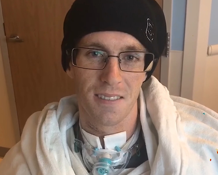 Young Jiu-Jitsu beginner wearing glasses and beanie in hospital after tragic freak accident during sparring session. Young Jiu-Jitsu beginner wearing glasses and beanie in hospital after tragic freak accident during sparring session.