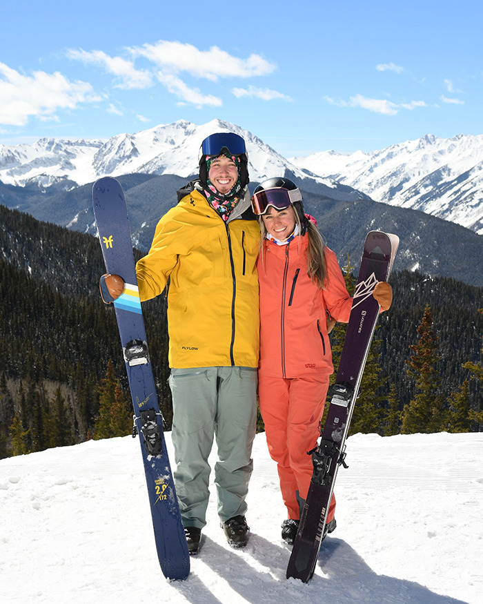 Newlywed couple smiling on snowy mountain with skis, enjoying honeymoon before tragedy near ankle-deep water. Newlywed couple smiling on snowy mountain with skis, enjoying honeymoon before tragedy near ankle-deep water.