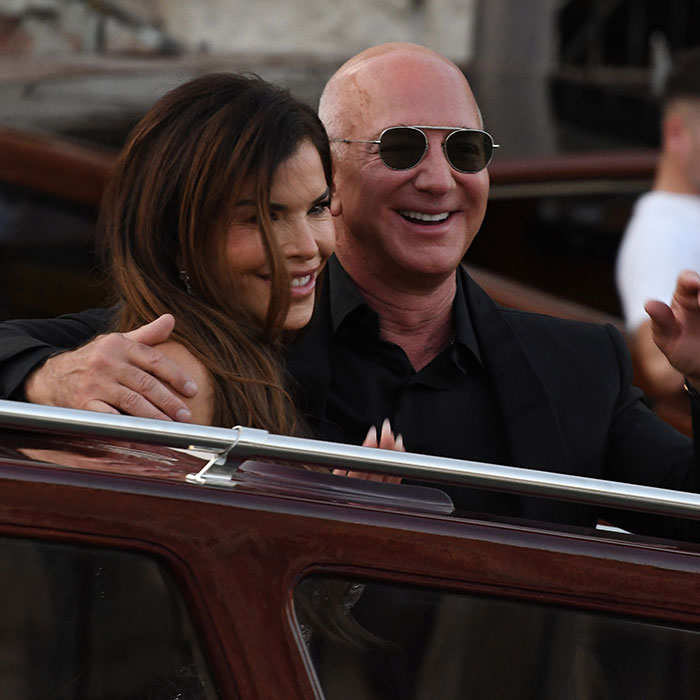 Jeff Bezos and Lauren Sánchez sharing a moment at a pajama-themed afterparty with racy revealing looks. Jeff Bezos and Lauren Sánchez sharing a moment at a pajama-themed afterparty with racy revealing looks.