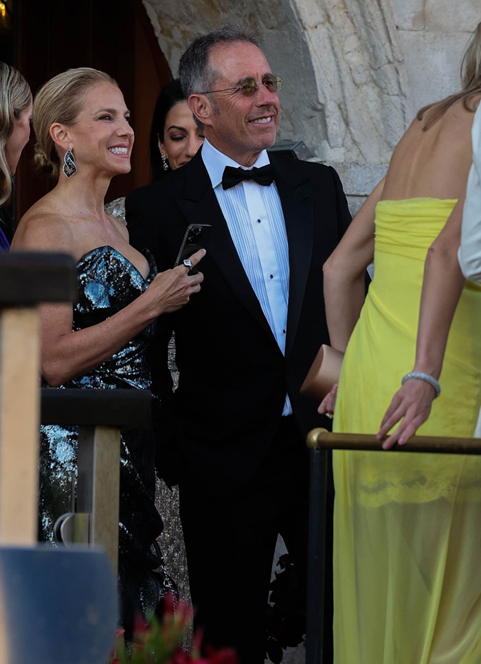 Strung-out celebrity looks at a wedding party, dressed in formal attire, socializing after weekend celebrations. Strung-out celebrity looks at a wedding party, dressed in formal attire, socializing after weekend celebrations.