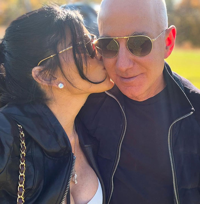 Lauren Sanchez kissing Jeff Bezos wearing sunglasses outdoors amid mass fury over lavish wedding details released Lauren Sanchez kissing Jeff Bezos wearing sunglasses outdoors amid mass fury over lavish wedding details released