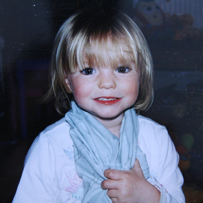 Young girl with blonde hair smiling and holding a cloth, related to Madeleine McCann mystery, clothing and bones found in dig samples. Young girl with blonde hair smiling and holding a cloth, related to Madeleine McCann mystery, clothing and bones found in dig samples.