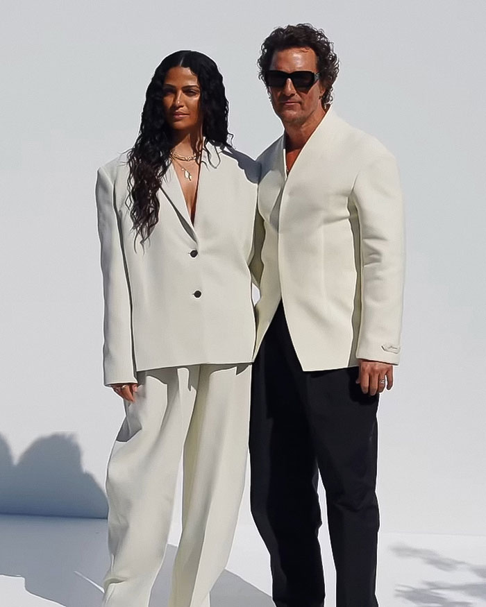 Matthew McConaughey and Emma Roberts posing in stylish outfits in a viral clip ignoring A-List star between them. Matthew McConaughey and Emma Roberts posing in stylish outfits in a viral clip ignoring A-List star between them.