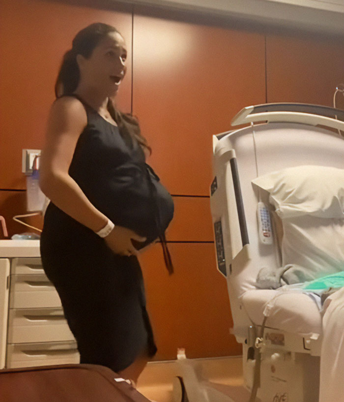 Pregnant woman in hospital room showcasing Meghan Markle twerking pregnancy video conspiracy theory. Pregnant woman in hospital room showcasing Meghan Markle twerking pregnancy video conspiracy theory.