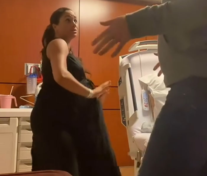 Meghan Markle in a hospital room with a concerned expression, captured during a controversial interview moment. Meghan Markle in a hospital room with a concerned expression, captured during a controversial interview moment.