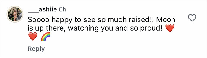 Comment expressing happiness over fundraising success with heart and rainbow emojis in a social media post. Comment expressing happiness over fundraising success with heart and rainbow emojis in a social media post.