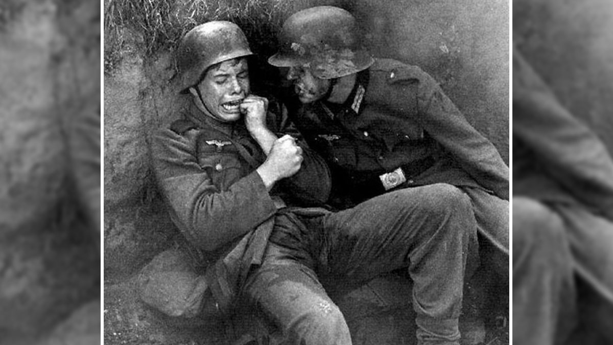 Two soldiers in World War II gear showing distress, illustrating more cosmic chaos in Nostradamus predictions for 2025.
