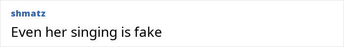 Comment reading Even her singing is fake in plain black text on a white background. Comment reading Even her singing is fake in plain black text on a white background.