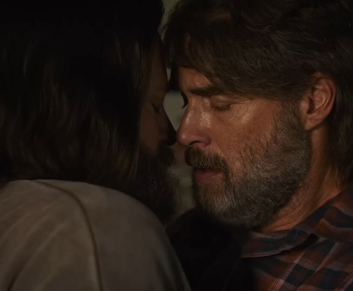 Two men with beards close together in an intimate moment, highlighting themes related to Nick Offerman and church acceptance. Two men with beards close together in an intimate moment, highlighting themes related to Nick Offerman and church acceptance.