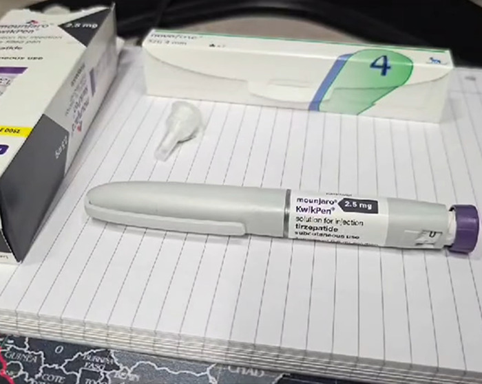 Mounjaro injection pen and Ozempic box placed on a notebook, highlighting organ-destroying drug concerns. Mounjaro injection pen and Ozempic box placed on a notebook, highlighting organ-destroying drug concerns.