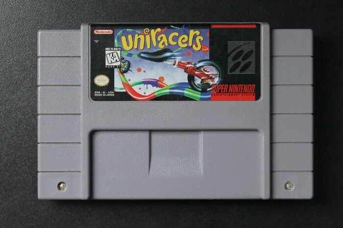 Super Nintendo game cartridge for Uniracers, representing skills people online needed before the 2000s but not anymore.
