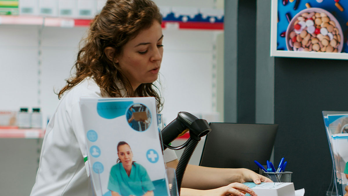 Woman refuses to babysit niece after SIL's rudeness, showing frustration while working at a desk in a medical setting