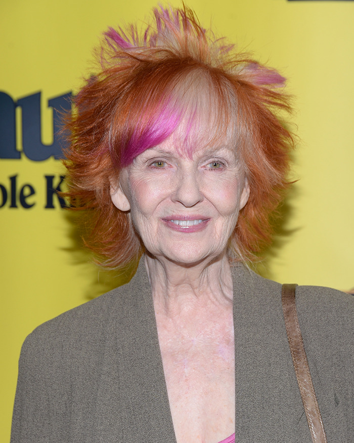 Iconic sitcom legend at 81 with bright orange and pink hair wearing a gray jacket during a rare public outing Iconic sitcom legend at 81 with bright orange and pink hair wearing a gray jacket during a rare public outing