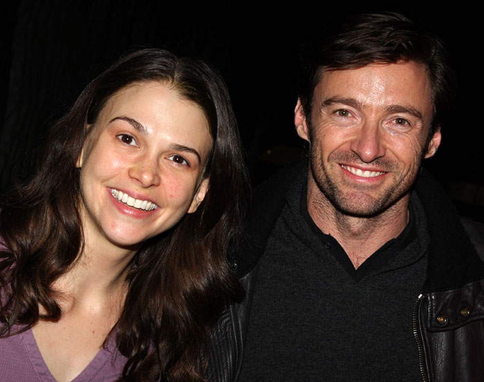 Hugh Jackman and Sutton Foster smiling together in a casual setting, revealing their long-standing connection. Hugh Jackman and Sutton Foster smiling together in a casual setting, revealing their long-standing connection.