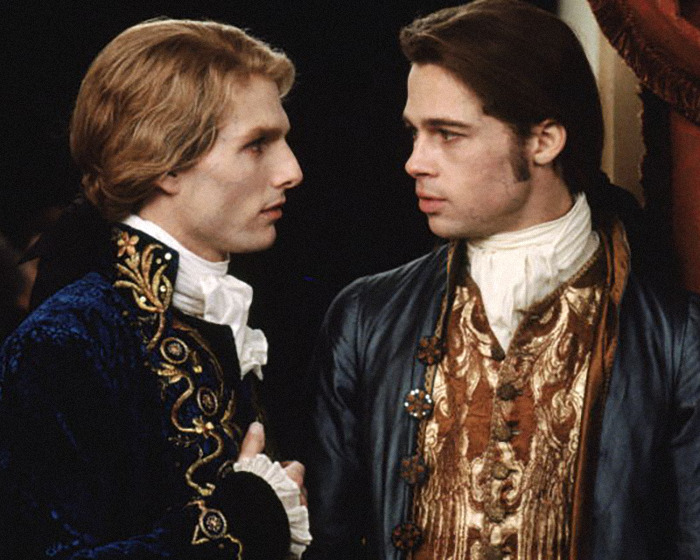 Two men dressed in ornate historical costumes, reflecting an 18th-century setting and style. Two men dressed in ornate historical costumes, reflecting an 18th-century setting and style.