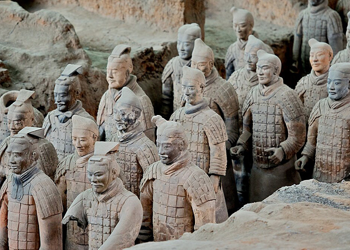 Terracotta warrior statues from 2000-year-old site showing damage after tourist jumped into 18-foot pit.