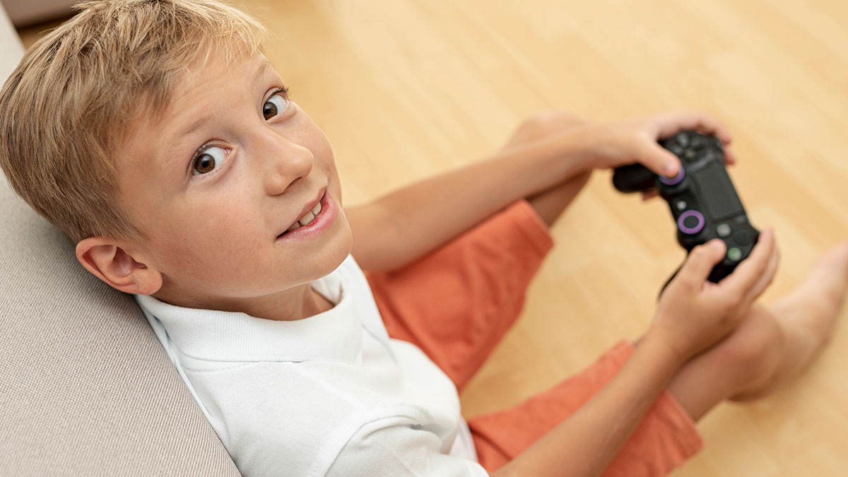 Boy playing video games, sitting on the floor with controller, unrelated to woman advice upset pregnant coworker concept.