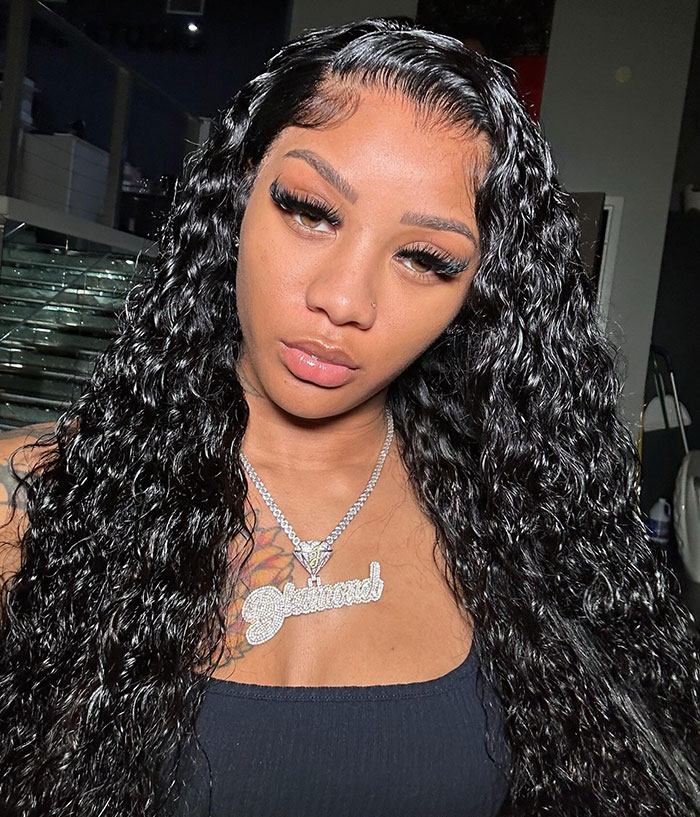 Young woman with long curly hair and a silver necklace, linked to former reality TV child star incident at Walmart. Young woman with long curly hair and a silver necklace, linked to former reality TV child star incident at Walmart.