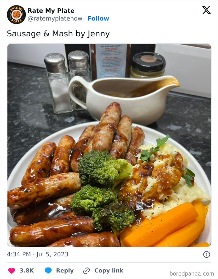 Plate of sausages, mashed potatoes, broccoli, and carrots with gravy, showcasing daily dose of British humor memes.