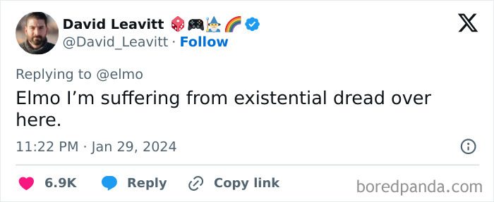 Screenshot of a tweet replying to Elmo, highlighting multiple violent messages shared on Elmo’s X account by a mystery culprit. Screenshot of a tweet replying to Elmo, highlighting multiple violent messages shared on Elmo’s X account by a mystery culprit.