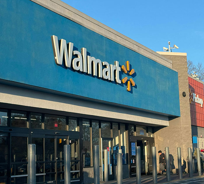 Walmart store exterior with shoppers entering, related to former reality TV child star attack incident. Walmart store exterior with shoppers entering, related to former reality TV child star attack incident.