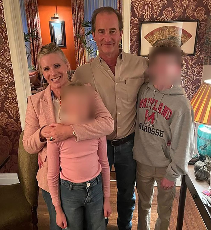 Coldplay HR exec and husband posing with children in a warmly decorated living room after mortgage approval. Coldplay HR exec and husband posing with children in a warmly decorated living room after mortgage approval.