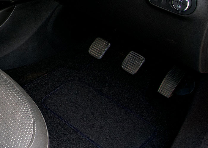 Car pedals inside a car showing a bizarre family habit related to driving that felt completely normal to them.