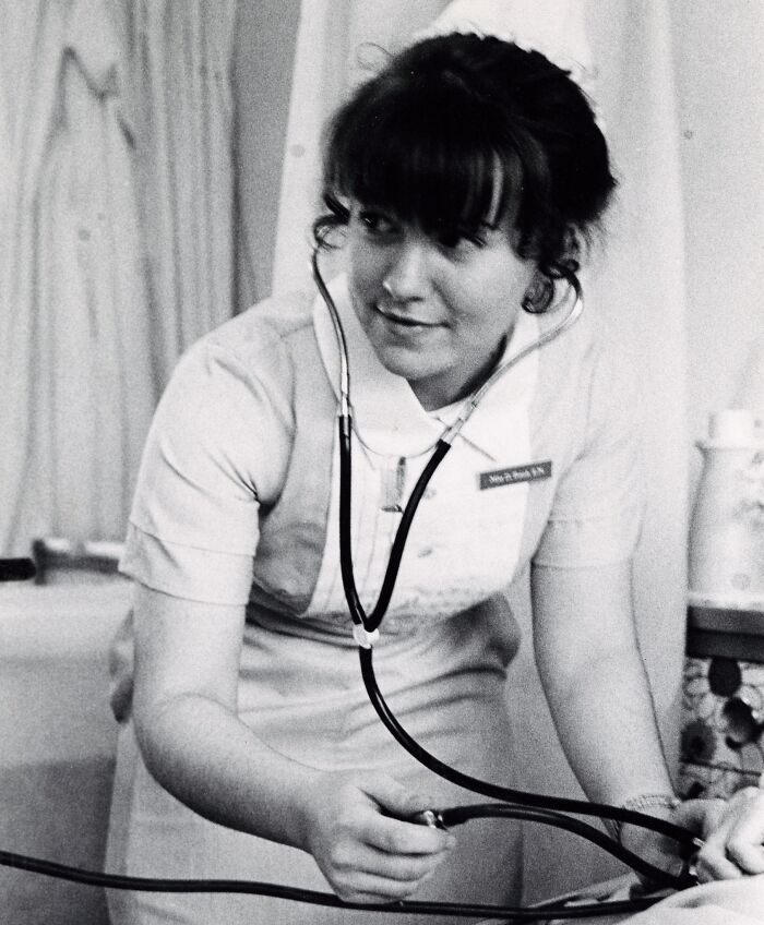 Vintage nurse wearing a classic uniform with stethoscope, symbolizing healing and hope in historic nursing photos.