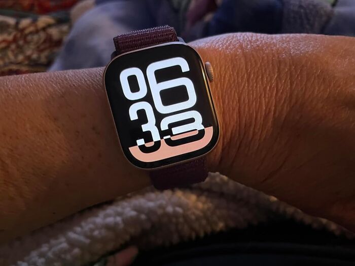 Smartwatch on wrist displaying time in bold numbers, featured in Prime Day electronic deals for tech lovers.