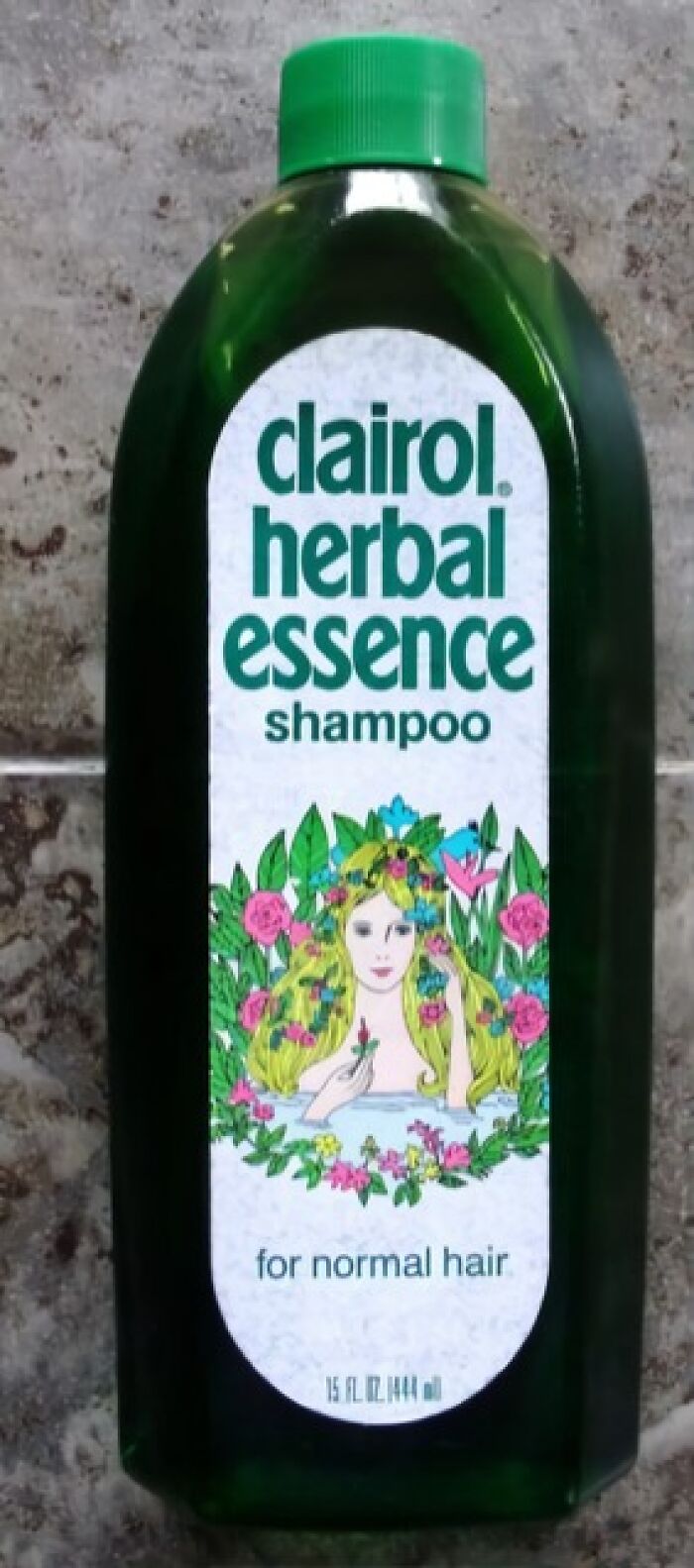 Vintage Clairol herbal essence shampoo bottle with floral illustration, a classic vintage thing from the 1970s collection.