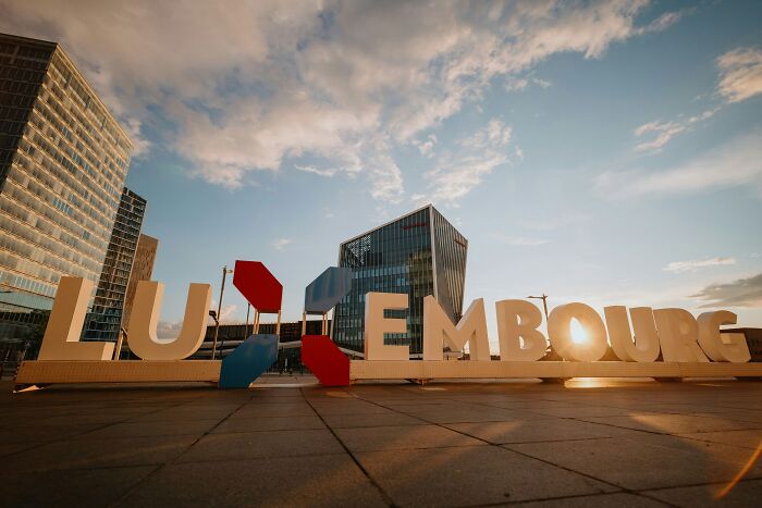 Large Luxembourg sign in an urban setting representing one of the smartest countries shaping the future of the world.