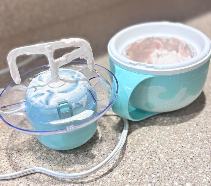 Compact blue ice cream maker with whipped mixture, showcasing one of the under-the-radar finds that understood the assignment.