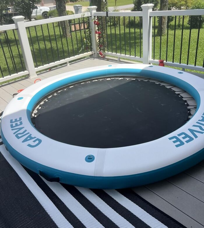 Inflatable round trampoline on a deck with white railing, showcasing one of the weirdest picks found on Amazon. Inflatable round trampoline on a deck with white railing, showcasing one of the weirdest picks found on Amazon.