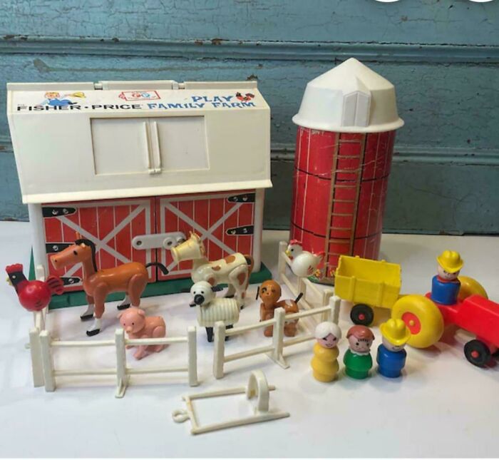 Vintage Fisher-Price Family Farm toy set with barn, silo, animals, tractor, and farmer figures, nostalgic pics for old memories