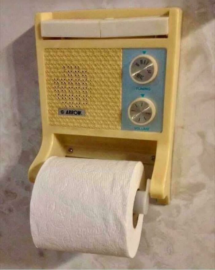 Vintage radio toilet paper holder mounted on a wall, showcasing nostalgic items from people realizing they’re old now.