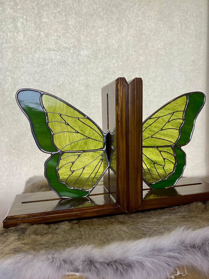 Stained glass butterfly wings bookends made with wood and green glass, a cool handmade creation people shared.
