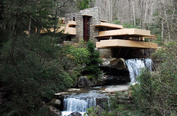 Famous historic home integrating nature and architecture with waterfalls and stone design, showcasing America's architectural heritage.